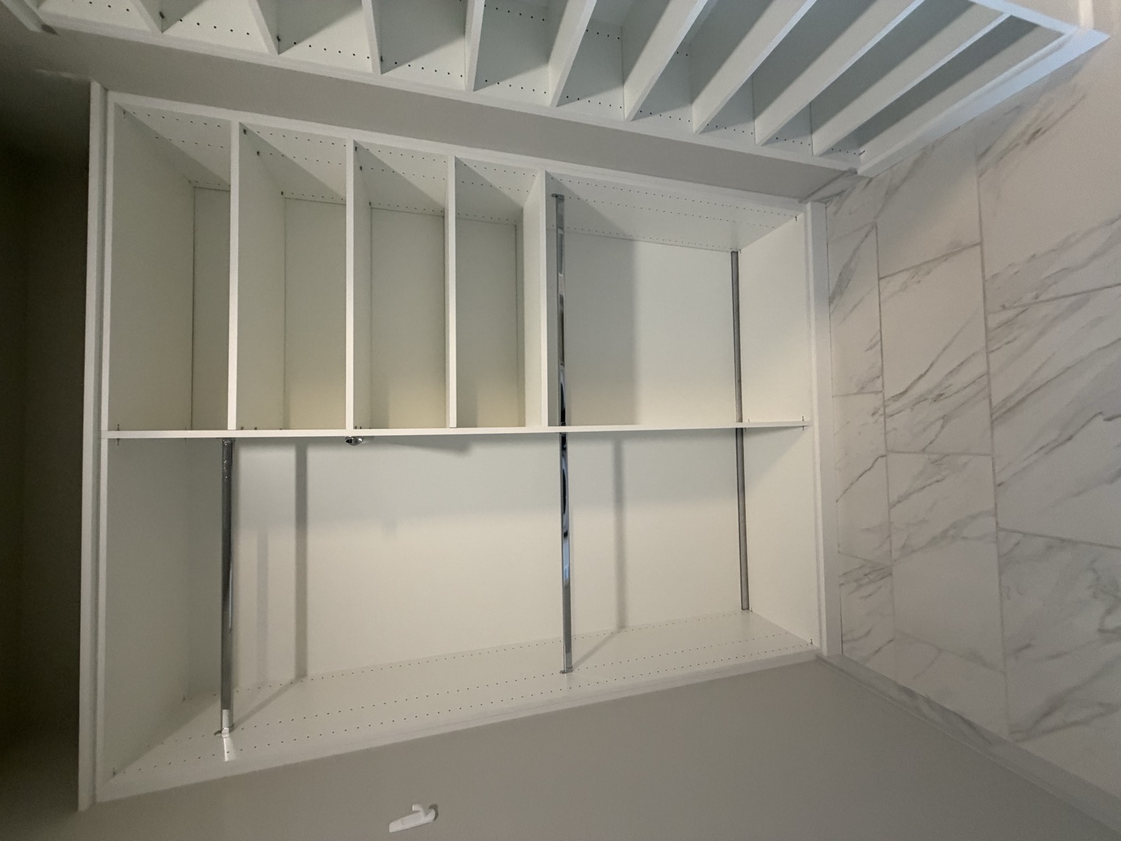 Organized walk-in closet